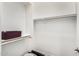 A well organized closet with white shelving and bar for hanging clothes at 2052 E Scorpio Pl, Chandler, AZ 85249