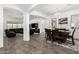 Open-concept dining room featuring stylish table, chairs and adjacent living spaces at 2052 E Scorpio Pl, Chandler, AZ 85249