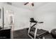 Bright exercise room featuring a treadmill and weightlifting equipment at 2052 E Scorpio Pl, Chandler, AZ 85249