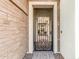 Elegant wrought iron security door provides access to the home's courtyard at 2052 E Scorpio Pl, Chandler, AZ 85249