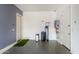 Clean garage with epoxy floors, water softener and access door at 2052 E Scorpio Pl, Chandler, AZ 85249