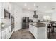 Kitchen features stainless steel appliances, granite counters, and recessed lighting at 2052 E Scorpio Pl, Chandler, AZ 85249