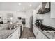 Kitchen features granite countertops, stainless steel appliances, and ample cabinet space at 2052 E Scorpio Pl, Chandler, AZ 85249