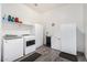 Well-equipped laundry room with modern washer, dryer, and ample storage at 2052 E Scorpio Pl, Chandler, AZ 85249