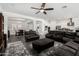 Open living room with ceiling fan, recessed lighting, and a view of the kitchen at 2052 E Scorpio Pl, Chandler, AZ 85249