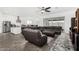 Open-concept living space featuring stylish furniture and view to kitchen and dining areas at 2052 E Scorpio Pl, Chandler, AZ 85249