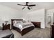 Spacious main bedroom featuring a ceiling fan and coordinating furniture at 2052 E Scorpio Pl, Chandler, AZ 85249