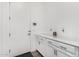 Neat mud room with white cabinetry and solid surface countertops at 2052 E Scorpio Pl, Chandler, AZ 85249