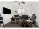 Spacious office with dual workstations, large window, and modern ceiling fan at 2052 E Scorpio Pl, Chandler, AZ 85249