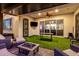 Under-cover patio with TV at 2052 E Scorpio Pl, Chandler, AZ 85249