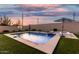 Gorgeous blue pool with spa, putting green, basketball hoop, and turf yard at 2052 E Scorpio Pl, Chandler, AZ 85249