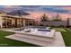 Beautiful pool and spa with a fountain feature, a cozy covered patio, and manicured landscaping creates an oasis at 2052 E Scorpio Pl, Chandler, AZ 85249
