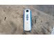 Somfy remote control for operating the home's smart features at 21985 E Quintero Rd, Queen Creek, AZ 85142