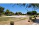 Community basketball court with lush green surroundings at 21985 E Quintero Rd, Queen Creek, AZ 85142