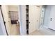 This bathroom features a shower/tub combo and a view into a hallway closet at 21985 E Quintero Rd, Queen Creek, AZ 85142