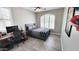 Bedroom featuring a window, ceiling fan, desk, and tiled floor at 21985 E Quintero Rd, Queen Creek, AZ 85142