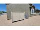 A well-maintained exterior featuring a panel and air conditioning unit at 21985 E Quintero Rd, Queen Creek, AZ 85142