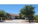 Inviting single-Gathering home with desert landscaping, a tile roof, and a spacious driveway at 21985 E Quintero Rd, Queen Creek, AZ 85142