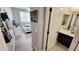 A hallway leading to a bedroom, complete with access to a bathroom at 21985 E Quintero Rd, Queen Creek, AZ 85142