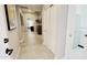 Hallway with tile flooring, leading to bedroom and other living areas at 21985 E Quintero Rd, Queen Creek, AZ 85142