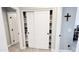 Hallway with storage closet and access to the bathroom at 21985 E Quintero Rd, Queen Creek, AZ 85142