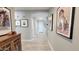 Hallway with beautiful floors and elegant decor leading to various rooms at 21985 E Quintero Rd, Queen Creek, AZ 85142