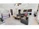Open living area seamlessly integrates the kitchen and dining space, perfect for entertaining at 21985 E Quintero Rd, Queen Creek, AZ 85142
