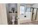 Well-lit bathroom with tile floors, separate toilet room, soaking tub and shower at 21985 E Quintero Rd, Queen Creek, AZ 85142