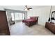 Comfortable bedroom with tile floors and stylish accents at 21985 E Quintero Rd, Queen Creek, AZ 85142
