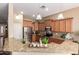 Kitchen featuring stainless steel appliances, granite countertops, and modern lighting at 22304 N 104Th Ln, Peoria, AZ 85383