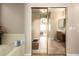 Elegant main bathroom with a soaking tub and mirror reflecting vanity, offering a spa-like experience at 22304 N 104Th Ln, Peoria, AZ 85383