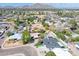 An aerial view showcasing neighborhood homes with mountain views in the distance at 2353 N 51St Pl, Phoenix, AZ 85008