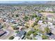 Stunning aerial view displaying the community's layout with tree-lined streets, proximity to open spaces, and distant mountain views at 2353 N 51St Pl, Phoenix, AZ 85008