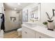 Bathroom featuring a sink with bright light and view into the shower at 2353 N 51St Pl, Phoenix, AZ 85008