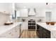 Open concept living space showcases the kitchen, dining, and living areas with natural light at 2353 N 51St Pl, Phoenix, AZ 85008