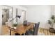 Charming office space with wood floors and a view to a modern bathroom and an additional door at 2353 N 51St Pl, Phoenix, AZ 85008