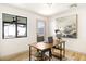 Bright office with wood-look floors, modern lighting, and rustic desk at 2353 N 51St Pl, Phoenix, AZ 85008