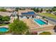 Aerial shot of a home with a pool, solar panels, and a dirt lot ready for landscaping at 24350 S 208Th Pl, Queen Creek, AZ 85142