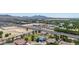 Inviting property with solar panels and a backyard pool, located in a desirable neighborhood, blending luxury with sustainability at 24350 S 208Th Pl, Queen Creek, AZ 85142