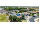 Beautiful home with solar panels, surrounded by lush greenery, creating a welcoming environment with sustainable features at 24350 S 208Th Pl, Queen Creek, AZ 85142