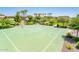Community basketball court surrounded by landscaping, perfect for sports and recreational activities at 2611 S Quaintance St, Gilbert, AZ 85295