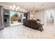 Bright living room with sliding glass doors to the patio and backyard at 2611 S Quaintance St, Gilbert, AZ 85295