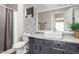 Modern bathroom featuring a stylish vanity, vessel sink, and neutral gray and white color scheme at 2650 W Union Hills Dr # 98, Phoenix, AZ 85027