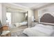 Bedroom featuring mirrored closet doors and a queen size bed at 2650 W Union Hills Dr # 98, Phoenix, AZ 85027