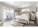 Cozy bedroom with a platform bed, natural light, and sliding door access to patio at 2650 W Union Hills Dr # 98, Phoenix, AZ 85027