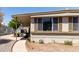 Exterior shot showing covered patio, desert landscaping and walkway at 2650 W Union Hills Dr # 98, Phoenix, AZ 85027