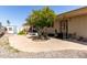 Charming home featuring a vibrant citrus tree and a welcoming concrete patio at 2650 W Union Hills Dr # 98, Phoenix, AZ 85027