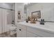 Clean bathroom features a double vanity with contemporary fixtures and a shower/tub combo at 28065 N 171St Dr, Surprise, AZ 85387