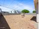 Large backyard with a swing set and plenty of space for activities at 2834 E Michael Dr, Phoenix, AZ 85032