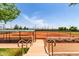 Well-maintained baseball field with dugouts and fencing, offering a great recreational amenity for residents at 2910 S Olivewood --, Mesa, AZ 85212